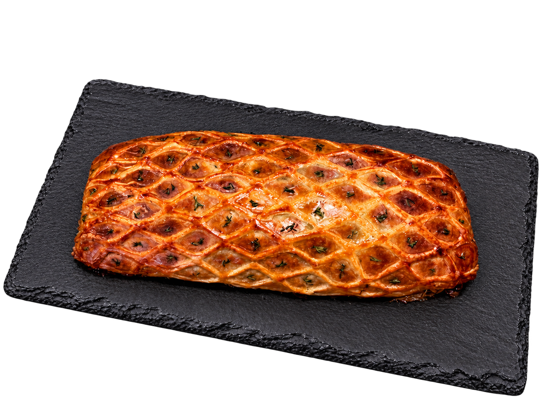 Finished Beef Wellington with a golden thyme-flecked lattice